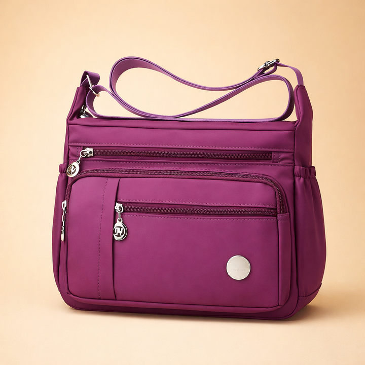 Stylish women's travel crossbody bag with multiple pockets, perfect for everyday practicality and elegant adventures.