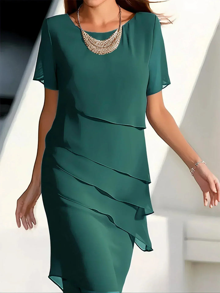 Comfortable green women's tummy control dress, stylish and flattering for work or a night out.