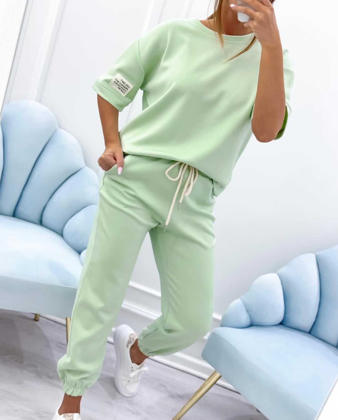 Soft, breathable women's short sleeve top and pant set, ideal for warm weather casual and loungewear.