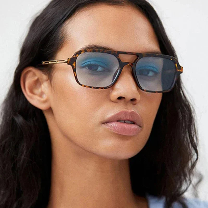 Stylish women's UV protection sunglasses, perfect for fashion-forward summer looks & everyday wear.