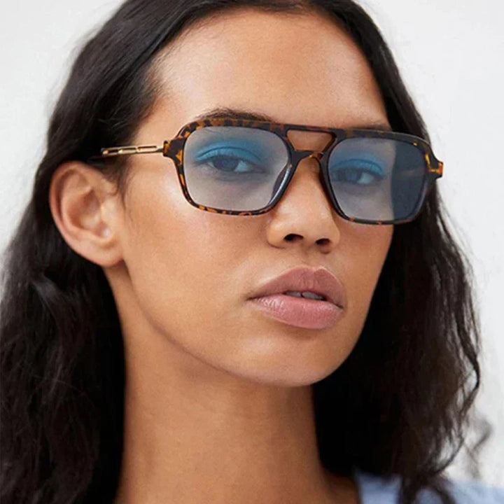 Stylish women's UV protection sunglasses, perfect for fashion-forward summer looks & everyday wear.