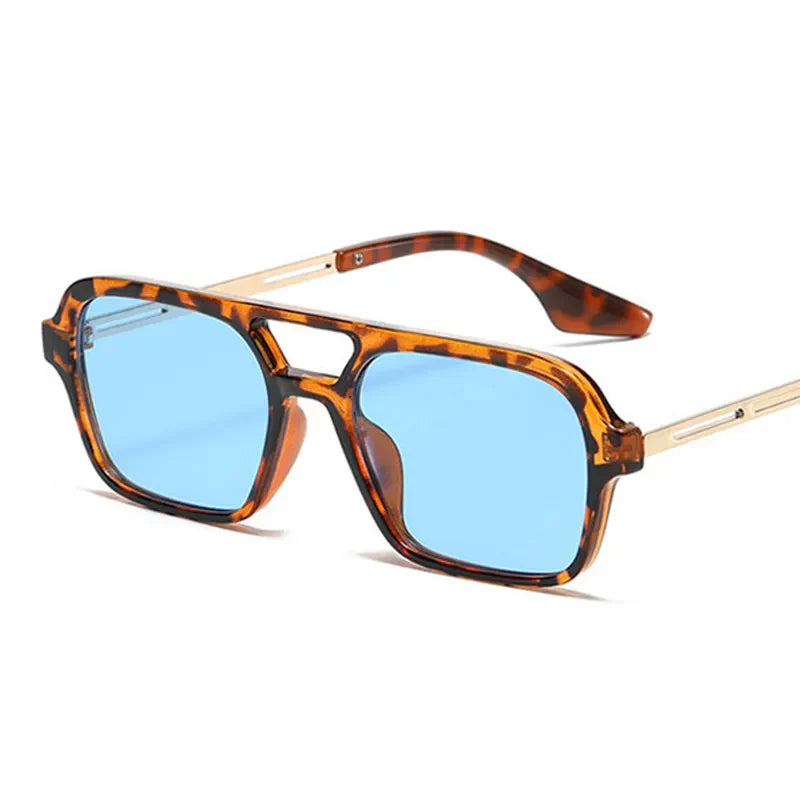Elegant women's sunglasses with UV protection, enhancing any everyday or beach outfit.