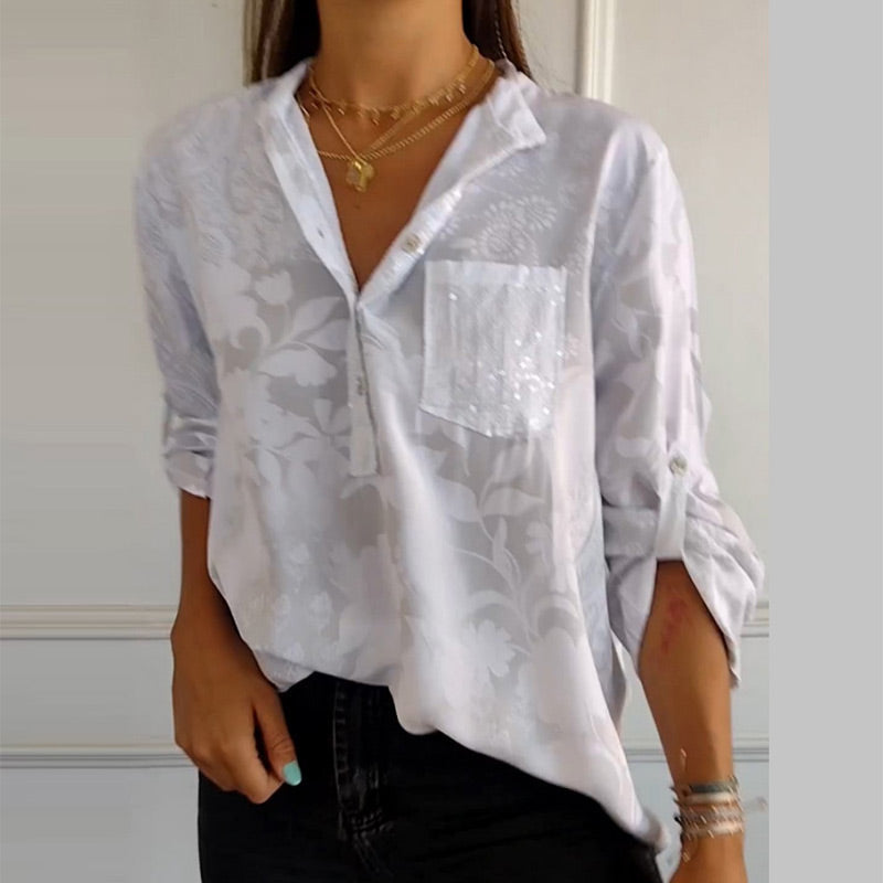 Stylish women's V-neck top with button placket, perfect for spring & summer casual wear.
