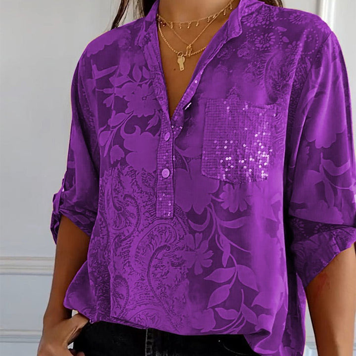 Elegant ladies V-neck blouse with front button placket, versatile for spring fashion & office casual.