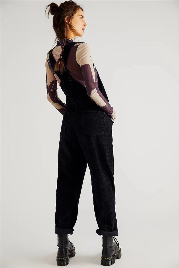 Fashionable women's corduroy one-piece jumpsuit, offering a comfortable and stylish vintage look for fall.