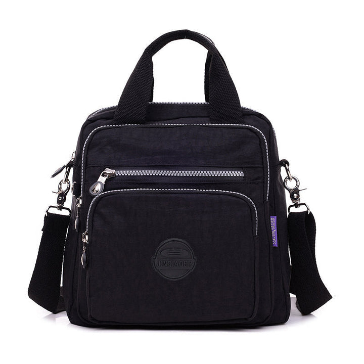 Practical women's water-resistant crossbody bag, multi-functional design for organized and hassle-free carrying.