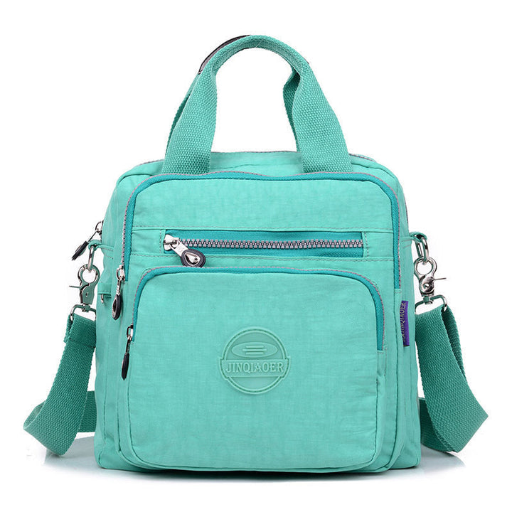 Secure multi-pocket women's water-resistant crossbody bag, ideal for keeping valuables safe during travel.