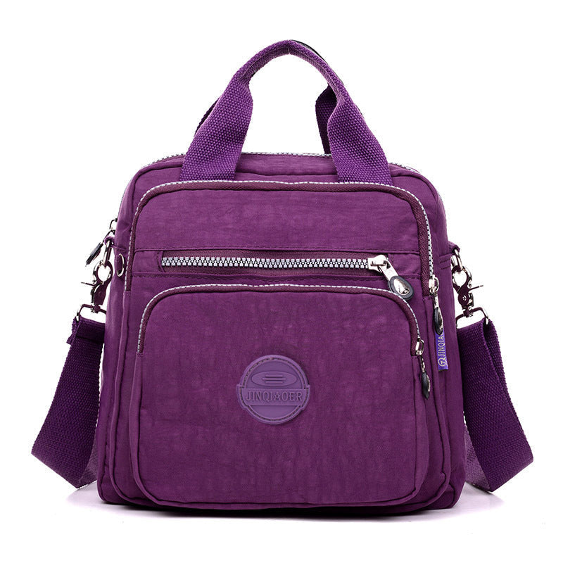 Everyday essential: women's water-resistant shoulder bag, lightweight & versatile for busy schedules.