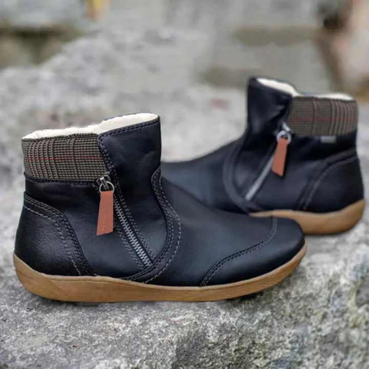 Cozy women's weather-resistant winter boots, perfect for cold days. Comfortable & stylish ankle footwear.