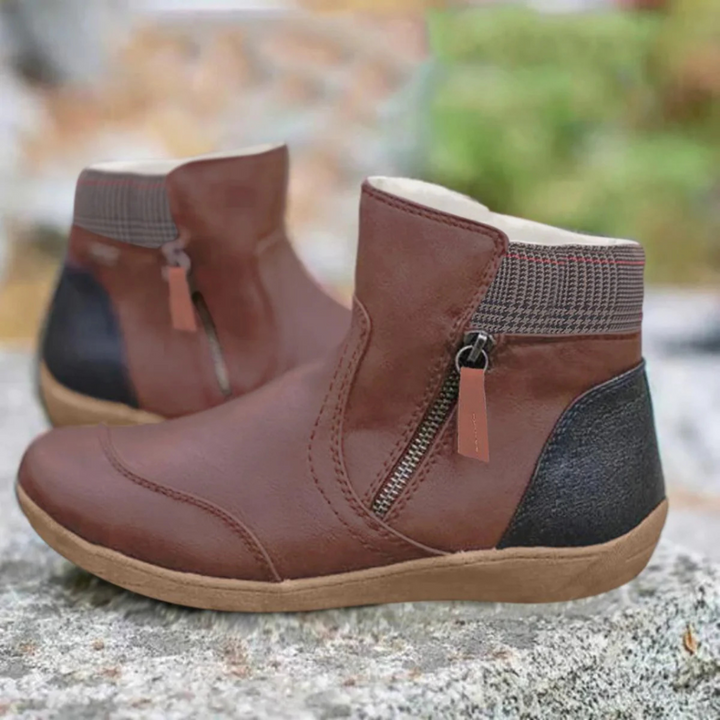 Durable women's casual winter ankle boots with lace-up design. Ideal for cold outdoor activities & everyday wear.