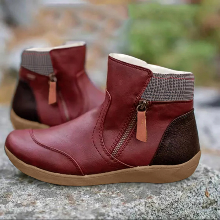 Women's weather-resistant winter ankle boots, lace-up style for cold days. Comfortable, durable & stylish footwear.