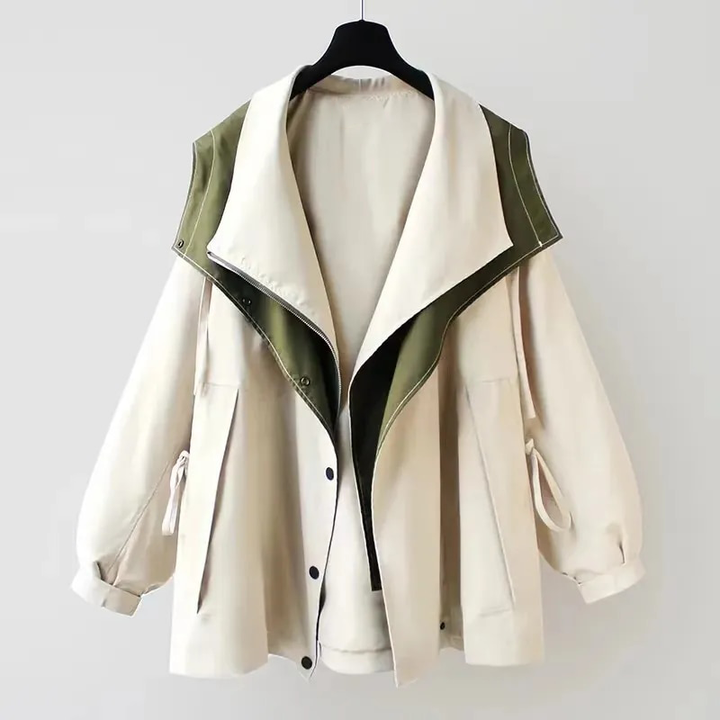 Stylish women's waterproof rain jacket for all seasons. Lightweight, fashionable outerwear offering weather protection.