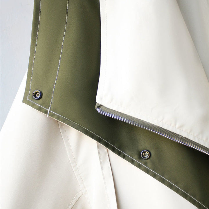 Front view of women's bestseller waterproof rain jacket. Designed for stylish all-weather protection & comfort.