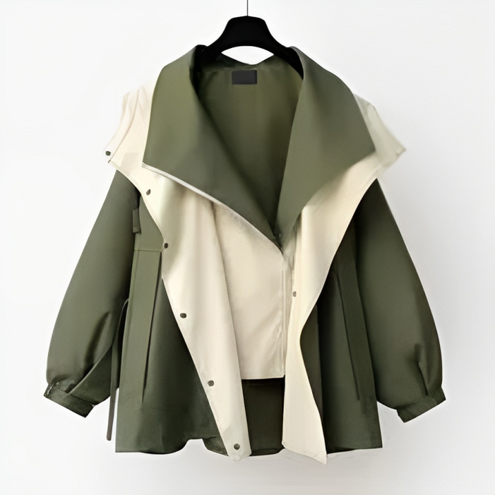 Back view of the women's stylish waterproof rain jacket. Fashionable, lightweight coat offering all-season weather protection.