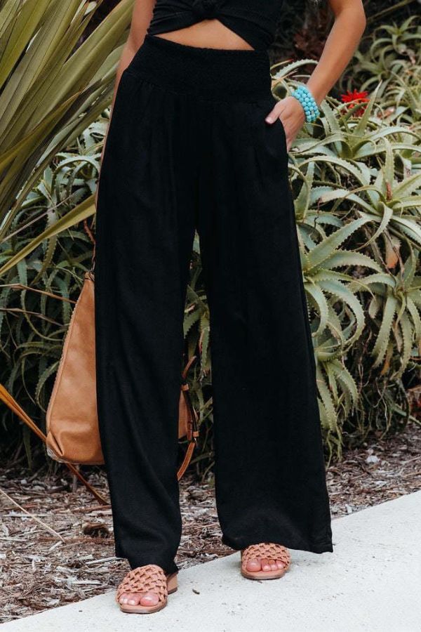 Versatile wide leg trousers for women, made from comfortable cotton perfect for casual everyday fashion.