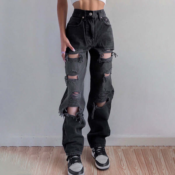 Trendy women's ripped jeans with a stylish raw hem. Distressed denim for a casual, effortless look.