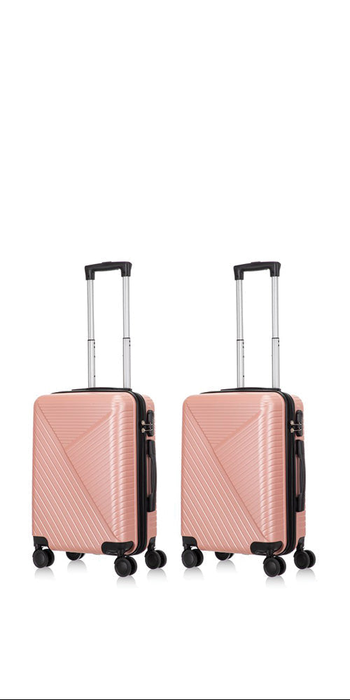 Two-piece hard shell luggage set with smooth spinner wheels, perfect for effortless travel & stylish vacations.
