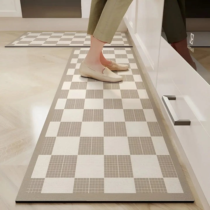 Highly absorbent kitchen mat. Quick-dry PVC non-slip floor mat for maximum spill protection & practical decor.