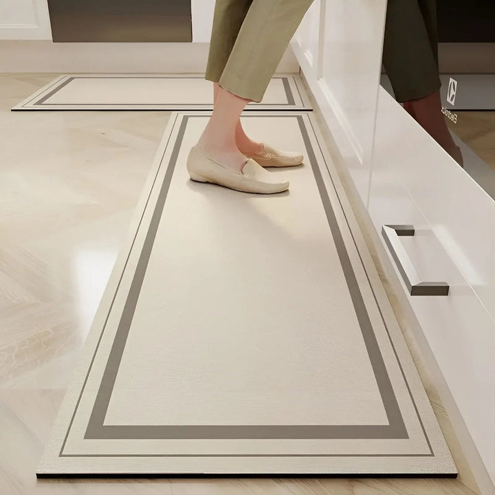 Premium ultra-absorbent non-slip kitchen mat. Anti-fatigue comfort, quick-dry, and spill protection for home safety.