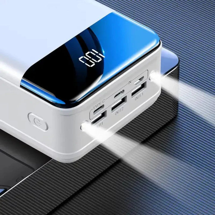 Ultra capacity 50K mAh power bank with versatile use, shown in sleek design and compact size for portable charging needs.