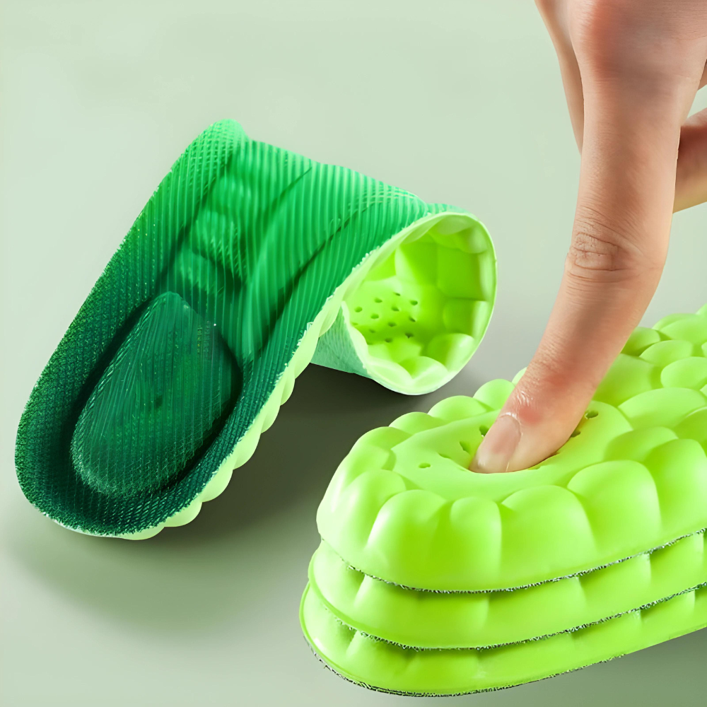 "Ultra-soft orthopedic running insoles in sleek green, providing all-day comfort and support for pain relief and active use."