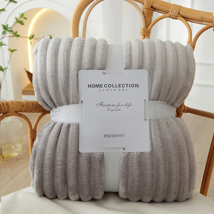 Embrace warmth with this soft wide striped fleece blanket.