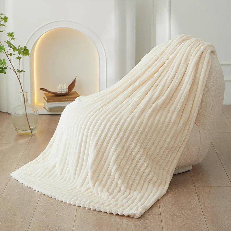 Plush wide striped flannel blanket, your go-to for cozy comfort.