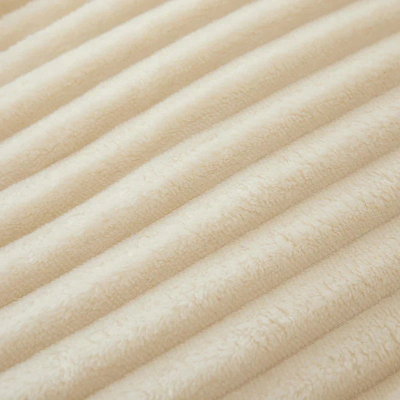 Softest wide striped fleece throw, an essential for ultimate relaxation.