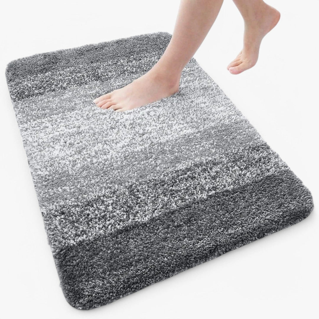 Plush microfiber UltraAbsorb bathroom mat. Soft, non-slip bath rug for ultimate comfort & safety in home decor.