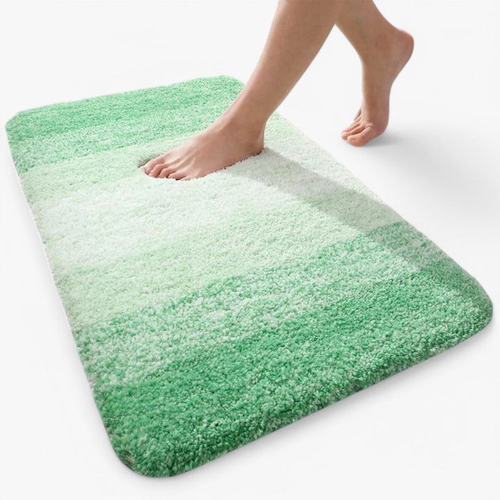 Premium UltraAbsorb non-slip bathroom mat. Super absorbent microfiber bath rug ensures dry, safe floors & ultimate comfort.