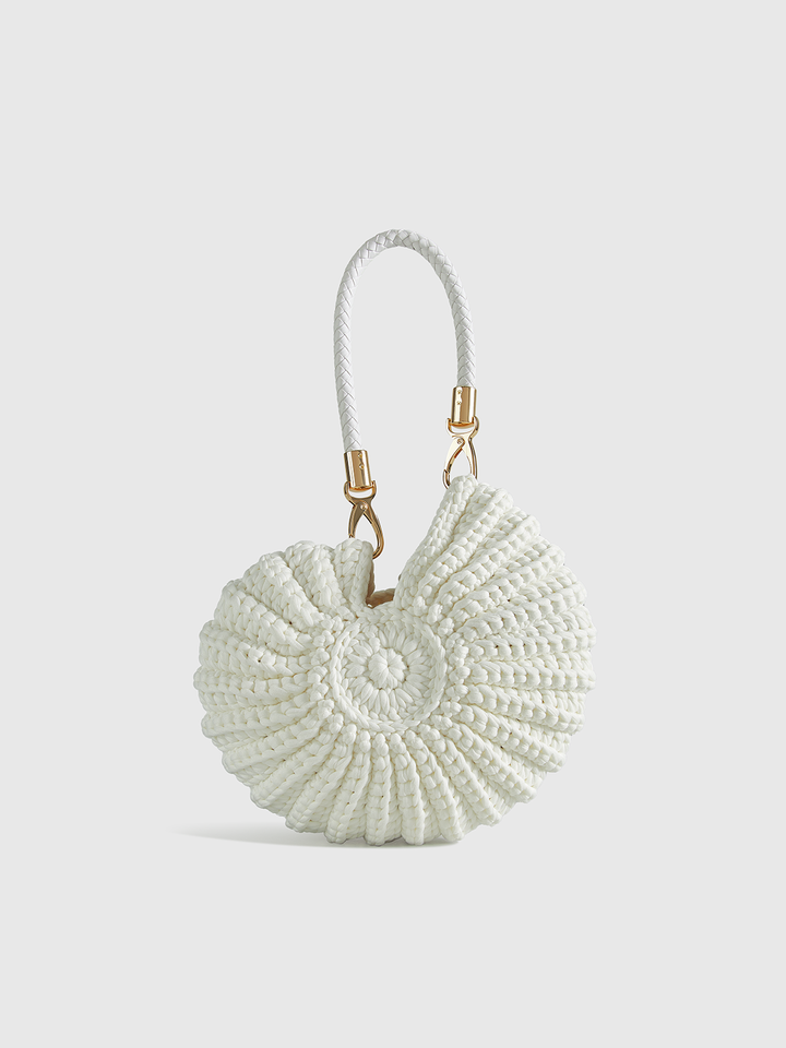 Elegant women's conch-shaped crocheted shoulder or clutch bag, a unique polyester accessory with artistic design.