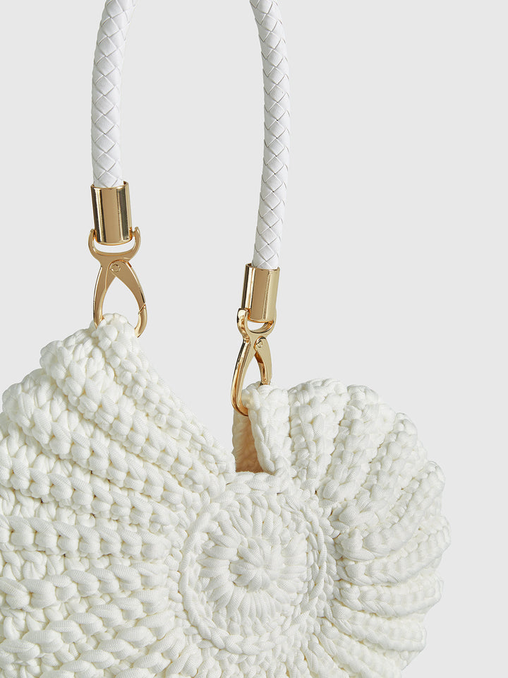 Hand-crocheted polyester conch bag for women, a unique and elegant accessory with an artistic design.