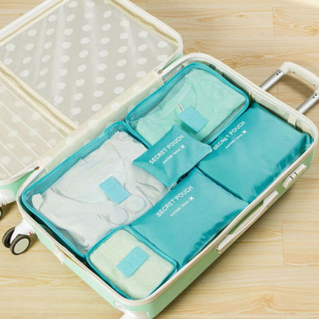Durable space-saving travel packing cubes for clothes, shoes, & toiletries. 12-piece organizer set.