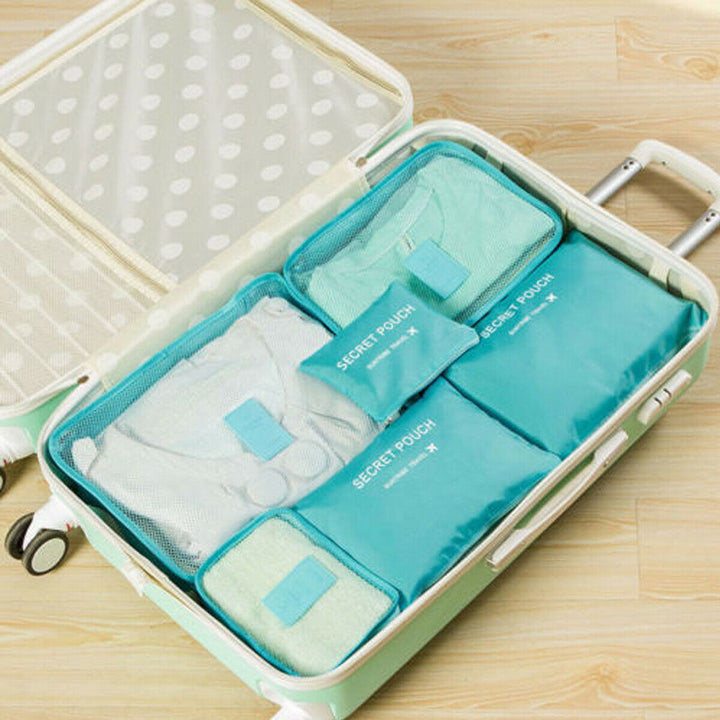Durable space-saving travel packing cubes for clothes, shoes, & toiletries. 12-piece organizer set.