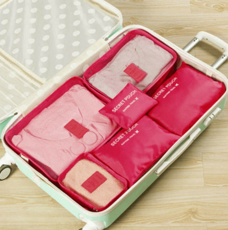 Organize your suitcase like a pro with this 12-piece space-saving luggage organizer & packing cubes.
