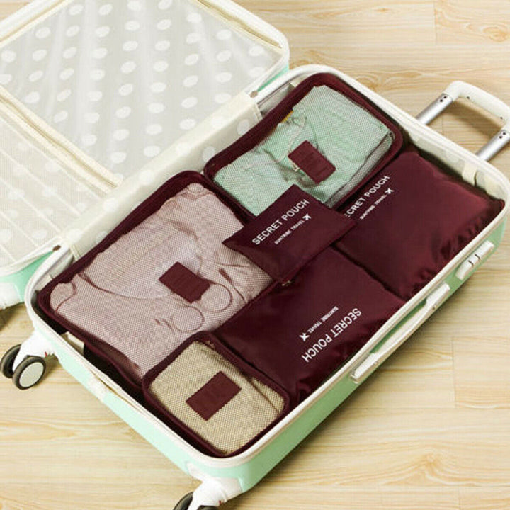 Complete 12-piece travel storage bag set: packing cubes for clothes, shoes, and toiletries.