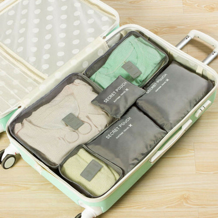 Stay organized on vacation with this 12-piece unisex travel packing cubes set. Waterproof & mesh.