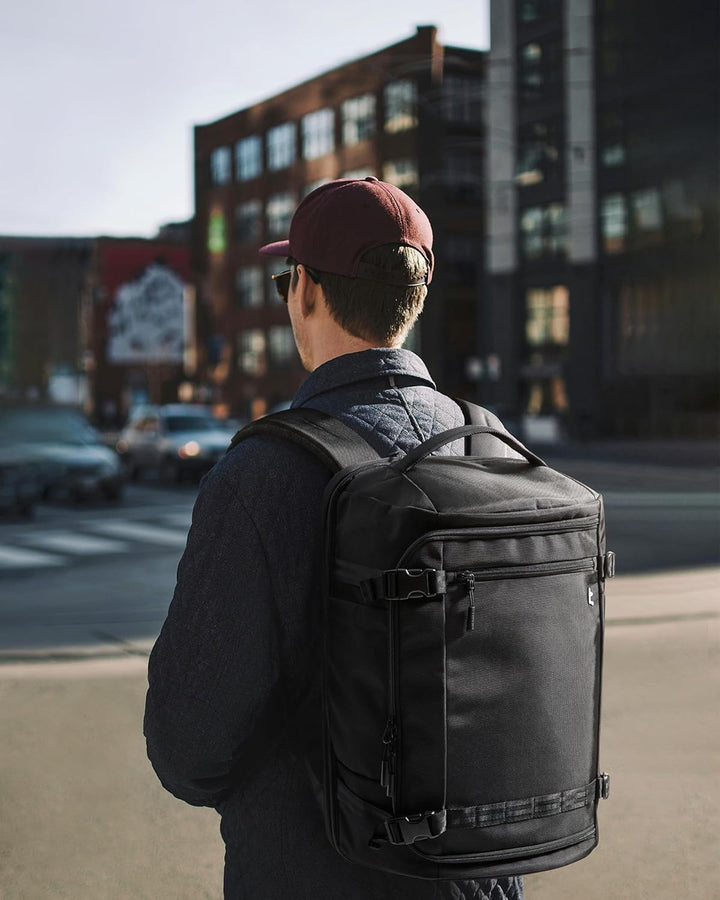 Unisex 38L TSA carry-on travel backpack with laptop compartment for easy airport security.