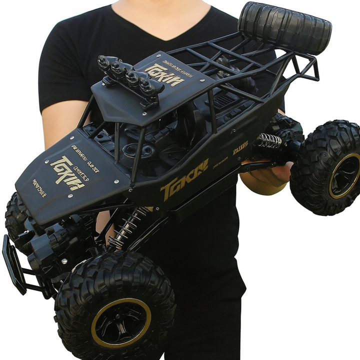 High-speed 4x4 remote control monster truck racing through an outdoor muddy trail. Rechargeable RC toy vehicle for fun.