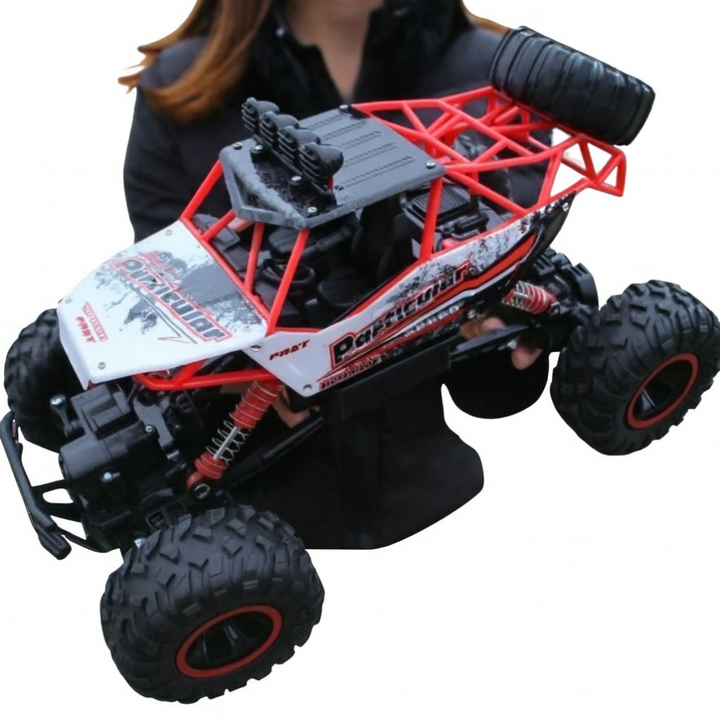 Detailed shot of a sturdy blue 4x4 RC monster truck with large tires. Radio control toy vehicle for all-terrain fun.