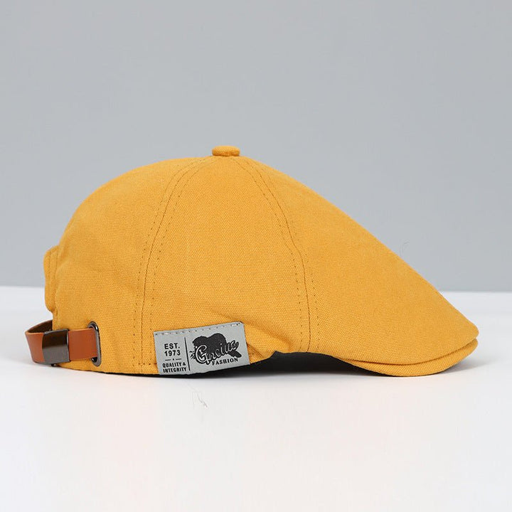 Bright yellow cotton beret, adjustable unisex accessory. A versatile classic hat perfect for adding a pop of color.