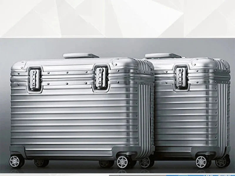Secure unisex aluminum-magnesium hardshell travel suitcase with integrated TSA lock, protecting valuables during airport journeys.