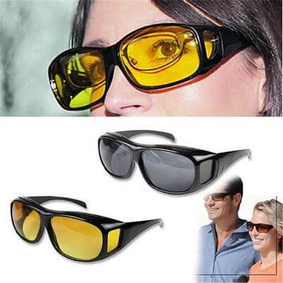 Driver wearing unisex anti-glare glasses, reducing glare from headlights/sun, clear road view.