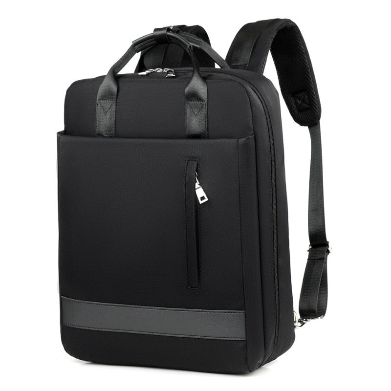 Sleek gray anti-theft travel backpack featuring concealed zippers & an external USB charging port for devices.
