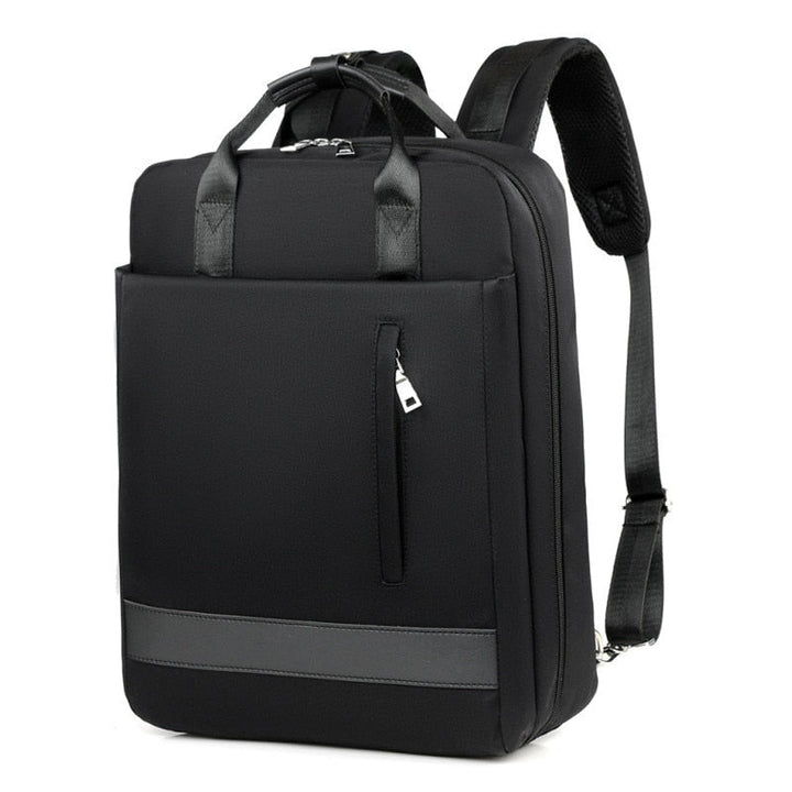 Sleek gray anti-theft travel backpack featuring concealed zippers & an external USB charging port for devices.
