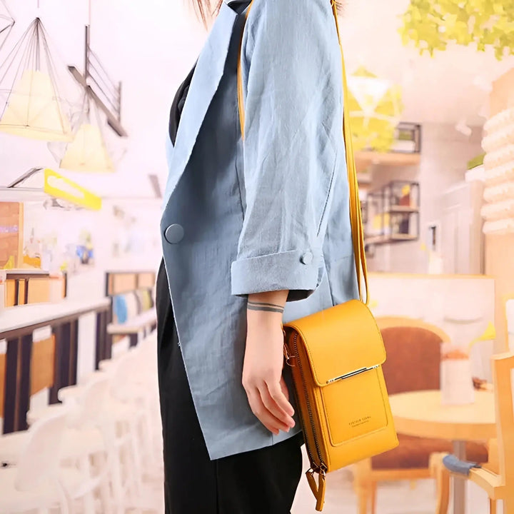 Unisex model wearing a stylish anti-theft leather crossbody bag, ideal for secure city travel and daily use.