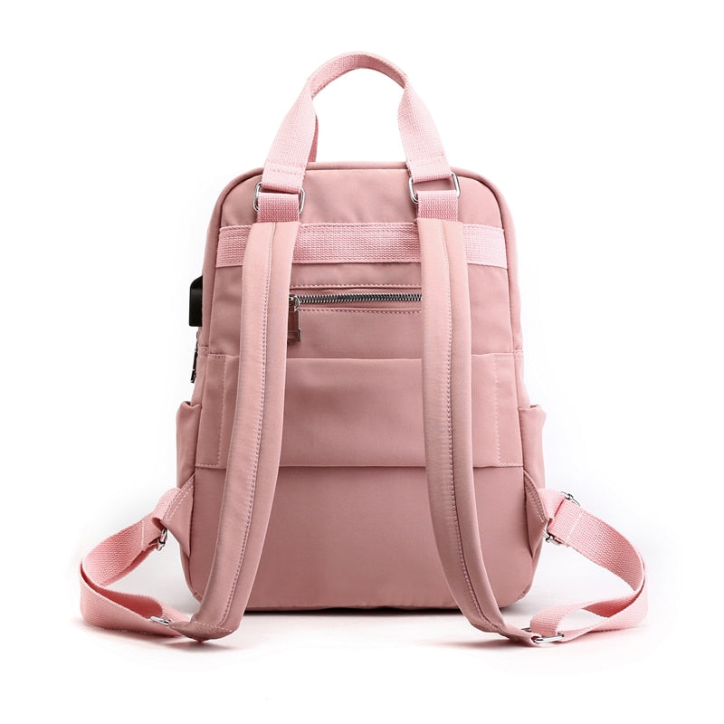 Premium unisex anti-theft backpack for travelers. Water-resistant, USB charging, highly organized.