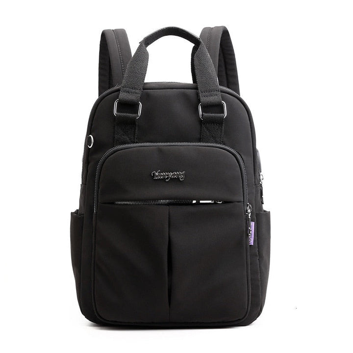Durable water-resistant commuter backpack with secure anti-theft features and integrated USB charging.