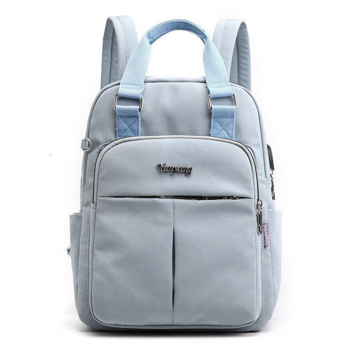 Organized laptop backpack: unisex anti-theft design, USB charging, spacious compartments for travel.