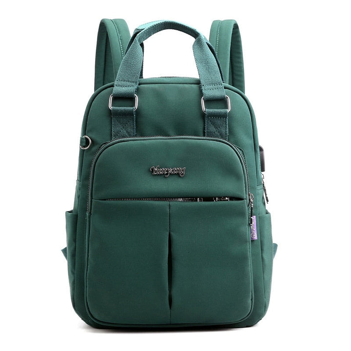Sleek unisex anti-theft travel bag with external USB charging & hidden pockets for security.